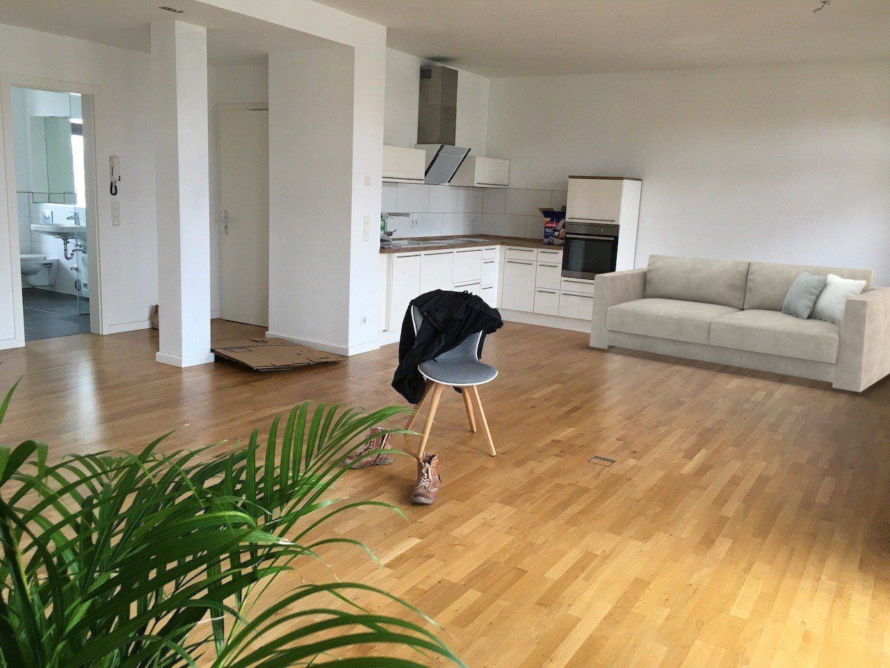 86 in sofa by the kitchen