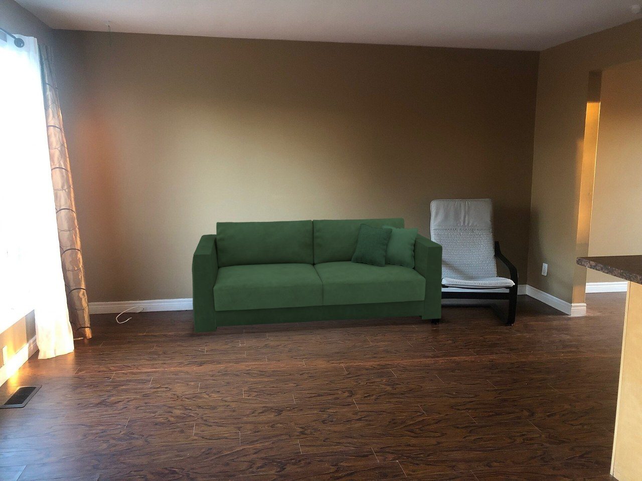 84 in green sofa in a 15 ft living room